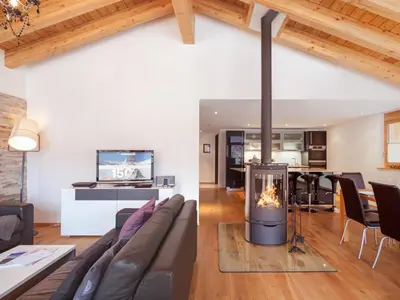 Ein Sitzbereich in der Unterkunft Chalet Nepomuk