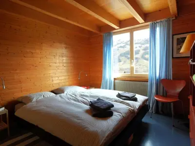Ein Bett oder Betten in einem Zimmer der Unterkunft Apartment Weidli- Chalet by Interhome