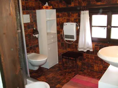 Ein Badezimmer in der Unterkunft Rustico Storelli
