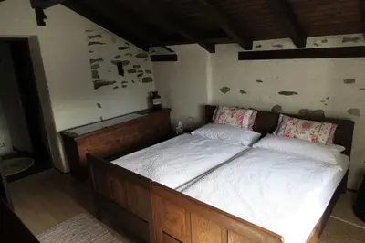 Ein Bett oder Betten in einem Zimmer der Unterkunft Rustico Storelli