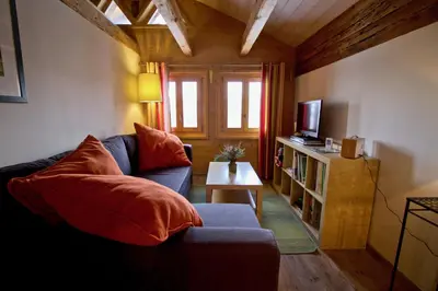 Ein Bett oder Betten in einem Zimmer der Unterkunft Appartement sous les combles - Chalet La Biolle - Vercorin