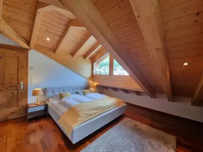 Ein Bett oder Betten in einem Zimmer der Unterkunft Penthouse Apartment Perla