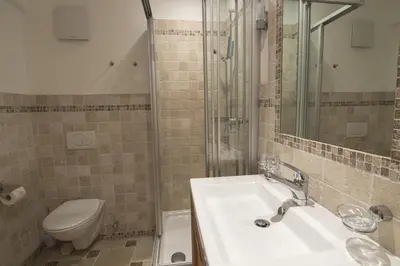 Ein Badezimmer in der Unterkunft Penthouse Apartment Perla