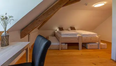 Ein Bett oder Betten in einem Zimmer der Unterkunft Hotel Belalp