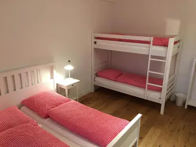 Ein Bett oder Betten in einem Zimmer der Unterkunft Adventure Hostel Interlaken