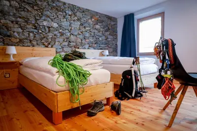 Ein Bett oder Betten in einem Zimmer der Unterkunft Bed&Bike Tremola San Gottardo
