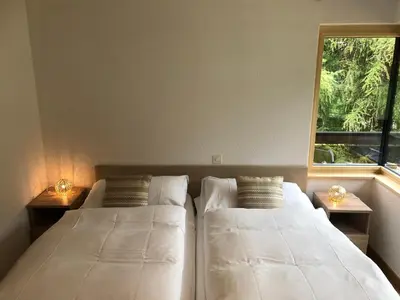 Ein Bett oder Betten in einem Zimmer der Unterkunft Haus Galileo