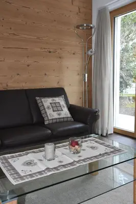Ein Sitzbereich in der Unterkunft FERIENWOHNUNGEN Chalet Hohturnen