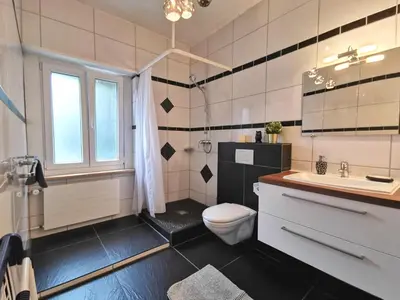 Ein Badezimmer in der Unterkunft Apartments Steinbock
