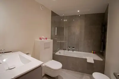 Ein Badezimmer in der Unterkunft La Villa Emeline - Apartment Emilie