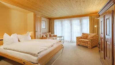 Ein Bett oder Betten in einem Zimmer der Unterkunft Chalet Kisseye by Zermatt Premium Apartments
