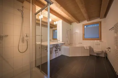 Ein Badezimmer in der Unterkunft Chalet Wyssbirg