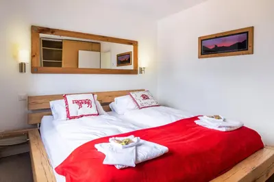 Ein Bett oder Betten in einem Zimmer der Unterkunft Chalet Hannegg Penthouse