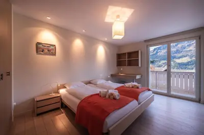 Ein Bett oder Betten in einem Zimmer der Unterkunft Chalet Brunner 4