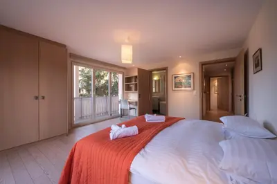 Ein Bett oder Betten in einem Zimmer der Unterkunft Chalet Brunner 4
