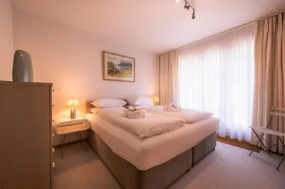 Ein Bett oder Betten in einem Zimmer der Unterkunft Chalet Bella Vista 4