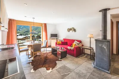 Ein Sitzbereich in der Unterkunft Apartment Alpharmonie