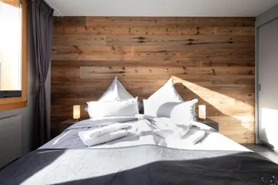 Ein Bett oder Betten in einem Zimmer der Unterkunft Alp n' rose