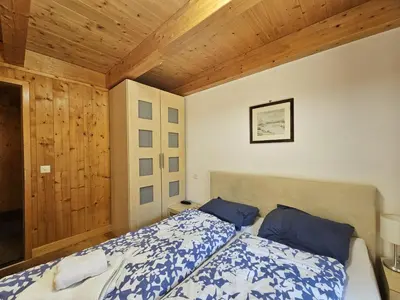 Ein Bett oder Betten in einem Zimmer der Unterkunft Mountain Village 11