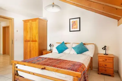 Ein Bett oder Betten in einem Zimmer der Unterkunft Hafod a Hendre