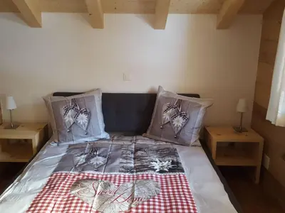 Ein Bett oder Betten in einem Zimmer der Unterkunft Apartment Chalet Wäschhüsi by Interhome