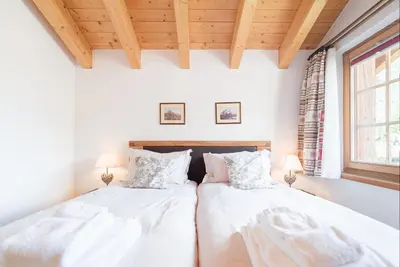 Ein Bett oder Betten in einem Zimmer der Unterkunft Chalet Ulysse