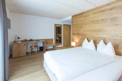 Ein Bett oder Betten in einem Zimmer der Unterkunft Hotel Reuti