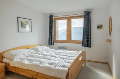 Ein Bett oder Betten in einem Zimmer der Unterkunft Camelot 3