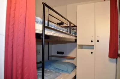 Ein Bett oder Betten in einem Zimmer der Unterkunft Heidi 16