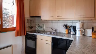 Küche/Küchenzeile in der Unterkunft Stachelbeere UG