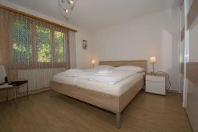 Ein Bett oder Betten in einem Zimmer der Unterkunft Ferienwohnung Helios