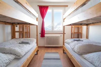 Ein Bett oder Betten in einem Zimmer der Unterkunft Hotel Schwarzsee