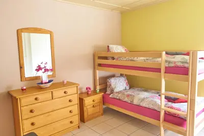 Ein Bett oder Betten in einem Zimmer der Unterkunft Blumenstrasse 22