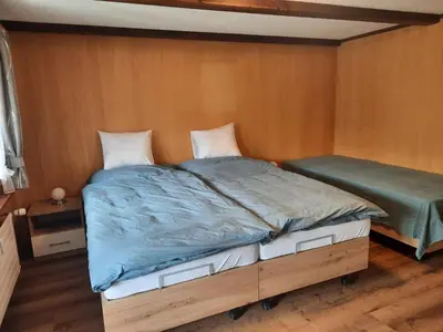 Ein Bett oder Betten in einem Zimmer der Unterkunft Gasthof Engelberg