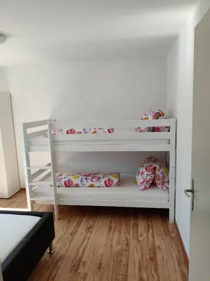 Ein Bett oder Betten in einem Zimmer der Unterkunft Apartment Tony