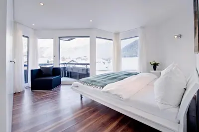 Ein Bett oder Betten in einem Zimmer der Unterkunft Haus Allegra