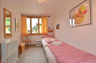Ein Bett oder Betten in einem Zimmer der Unterkunft Chalet Azeno OG