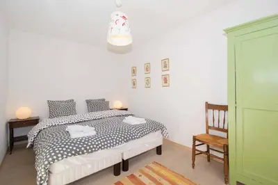 Ein Bett oder Betten in einem Zimmer der Unterkunft Ferienwohnung Gartenweg