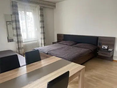Ein Bett oder Betten in einem Zimmer der Unterkunft Walters Hostel Interlaken