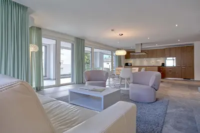 Ein Sitzbereich in der Unterkunft Apartment JungfrauCenter Brienzersee - GRIWA RENT