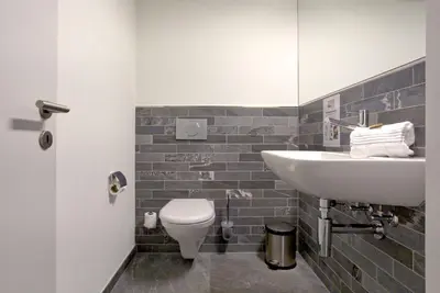 Ein Badezimmer in der Unterkunft Apartment JungfrauCenter Schynige Platte - GRIWA RENT AG