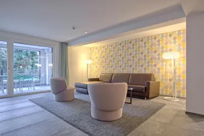Ein Sitzbereich in der Unterkunft Apartment JungfrauCenter Bällenhöchst - GRIWA RENT AG