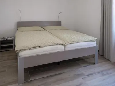 Ein Bett oder Betten in einem Zimmer der Unterkunft Apartment Zurschmitten 16 1- UG Süd by Interhome