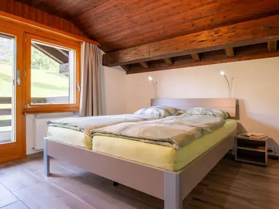 Ein Bett oder Betten in einem Zimmer der Unterkunft Apartment Zurschmitten 17 1- OG Süd by Interhome
