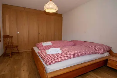 Ein Bett oder Betten in einem Zimmer der Unterkunft Ferienwohnung Senggi