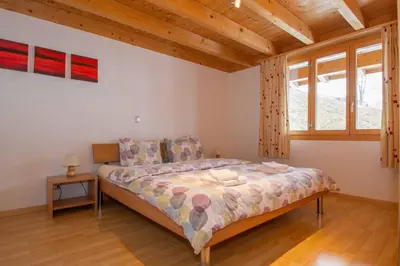 Ein Bett oder Betten in einem Zimmer der Unterkunft Ferienwohnung Schützenrain DG