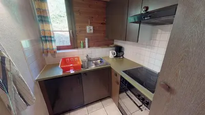 Küche/Küchenzeile in der Unterkunft Tschuggen 75