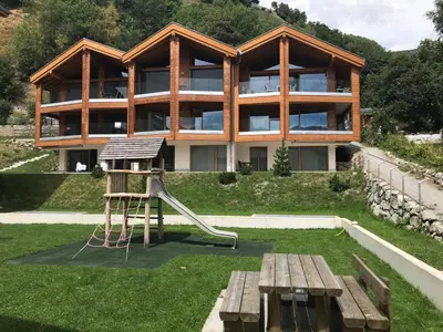 Ein Garten an der Unterkunft Bergquell Haus E