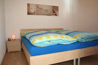 Ein Bett oder Betten in einem Zimmer der Unterkunft Chämihitta