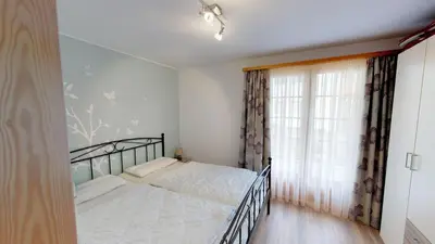 Ein Bett oder Betten in einem Zimmer der Unterkunft Mischi